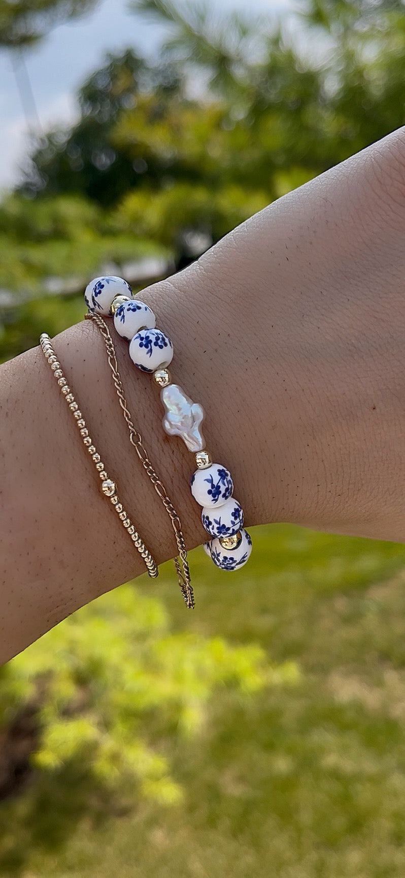 Blue floral pearl cross
