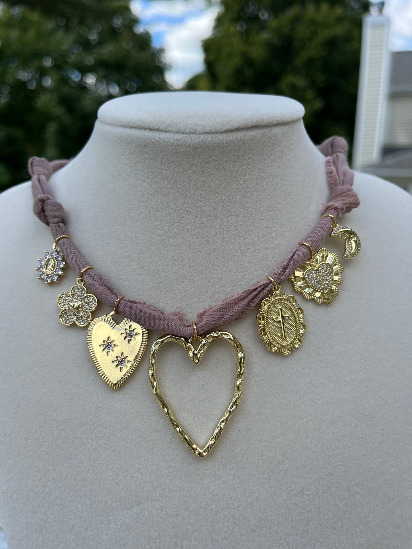 neutral girl charm necklace