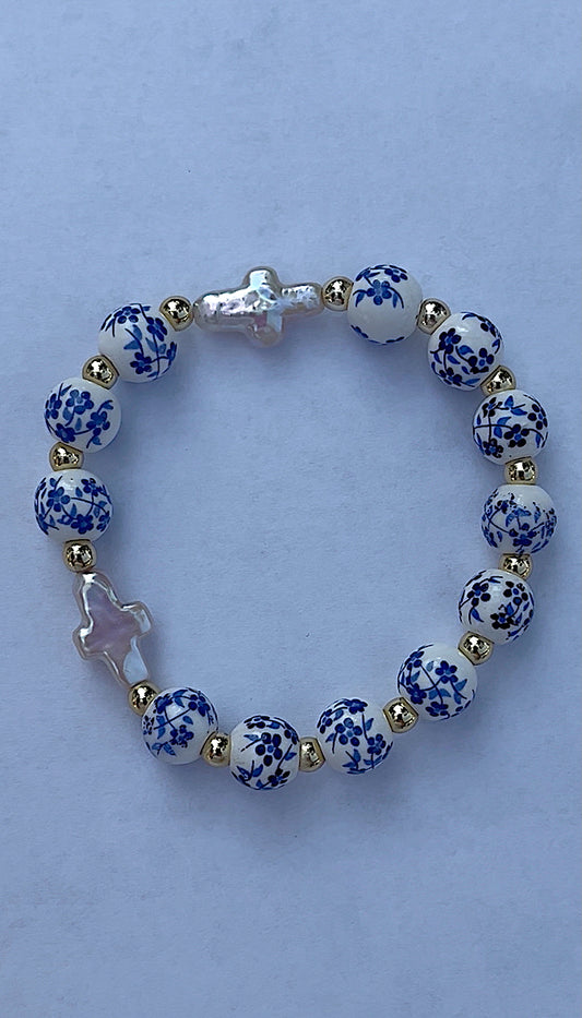 Blue floral double pearl cross